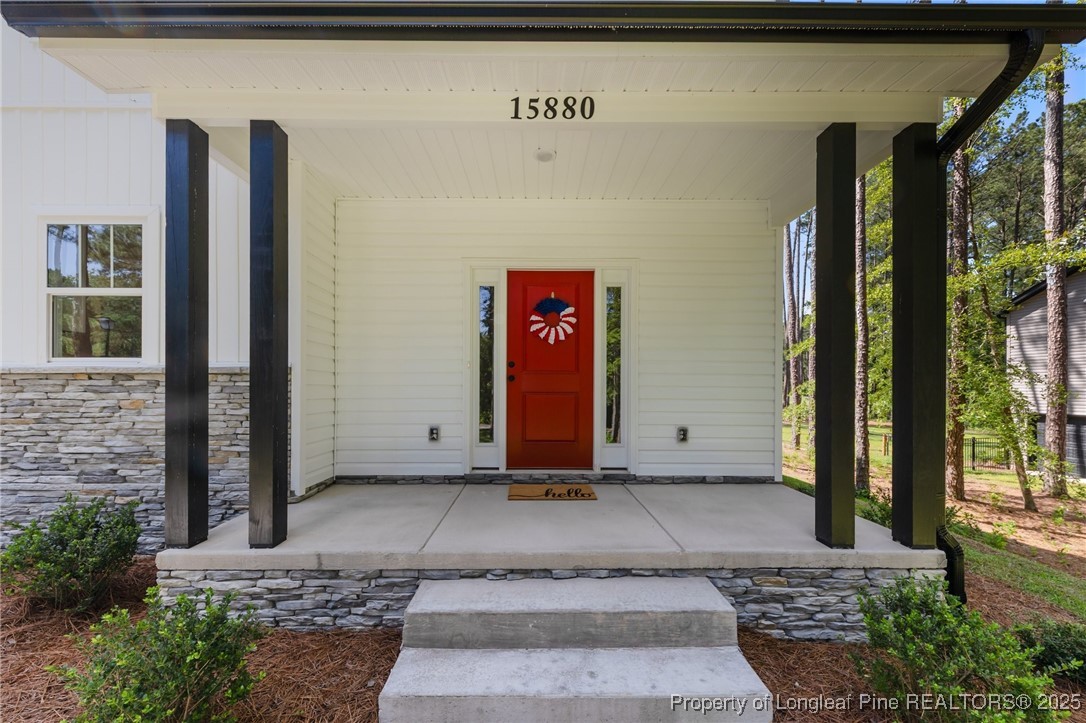 15880 Fox Lane Wagram, NC 28396 - Photo 3 of 33 a view of a entryway door of the house