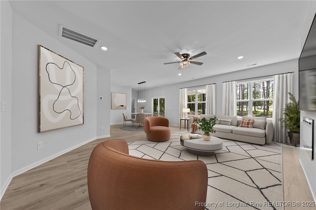 15880 Fox Lane Wagram, NC 28396 - Photo 5 of 33 a living room with furniture and a large window