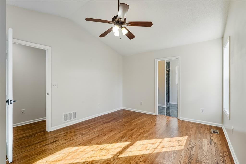 615 Amberwood Place Euharlee, GA 30145 - Photo 16 of 37 a view of empty room with wooden floor