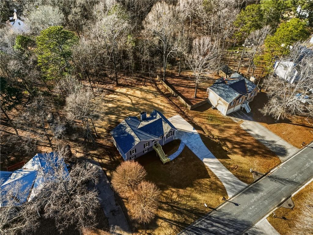 615 Amberwood Place Euharlee, GA 30145 - Photo 2 of 37 a view of a house with a yard