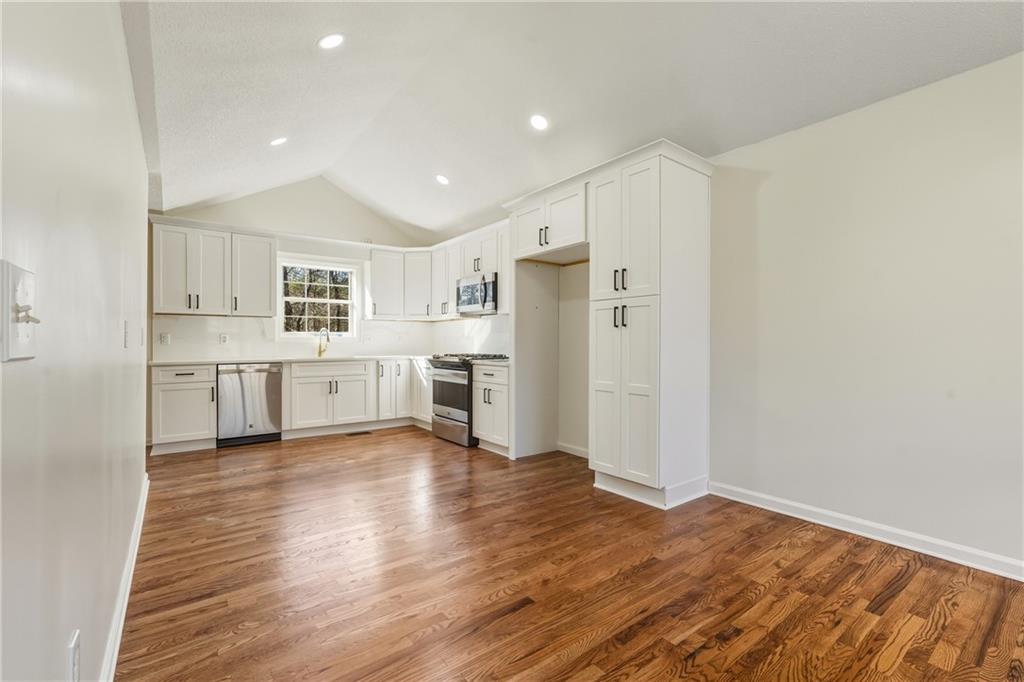 615 Amberwood Place Euharlee, GA 30145 - Photo 8 of 37 a view of kitchen with wooden floor