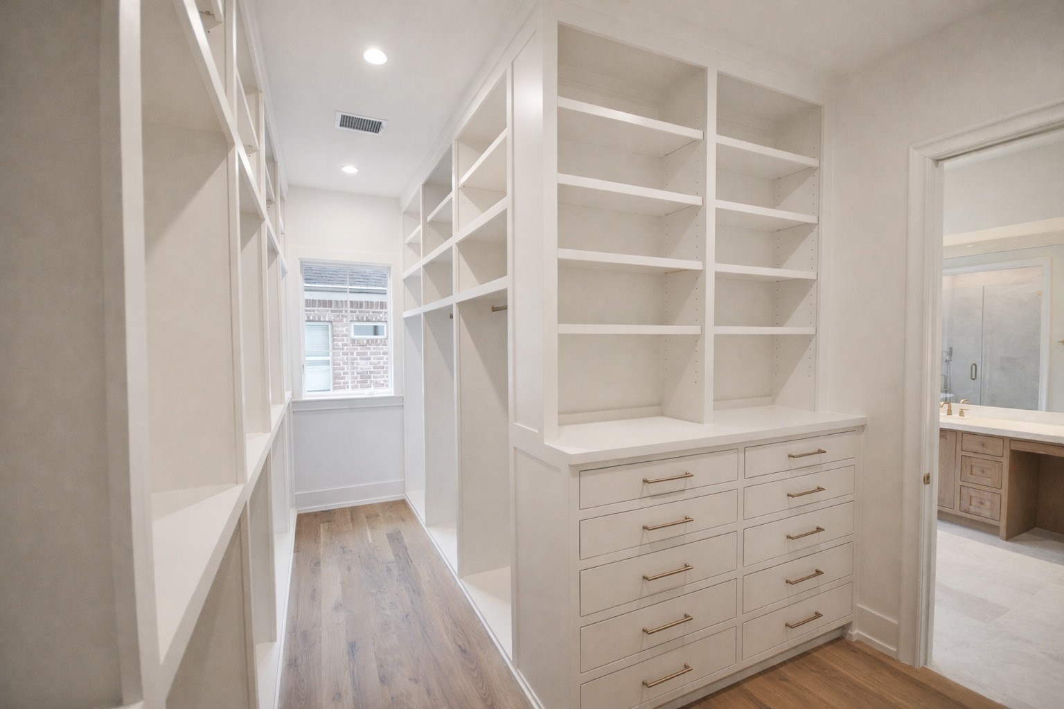 4107 Whitman Street Houston, TX 77027 - Photo 13 of 29 a view of an empty room with cabinet and a window