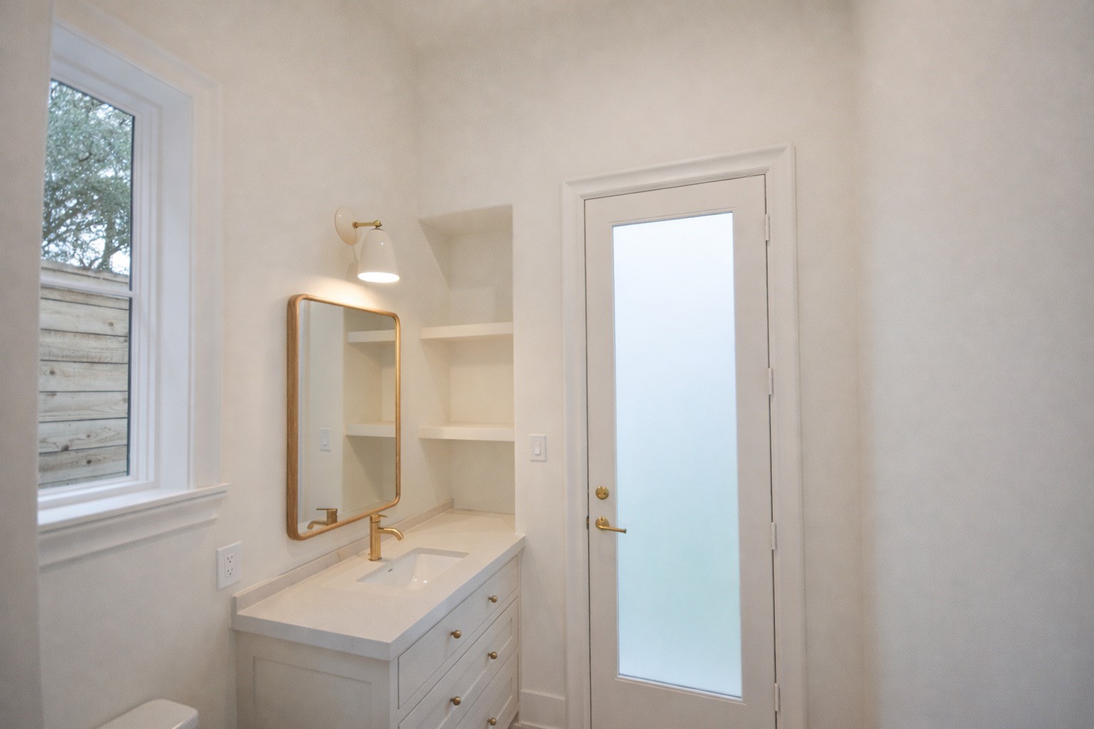 4107 Whitman Street Houston, TX 77027 - Photo 22 of 29 a bathroom with a sink and a mirror