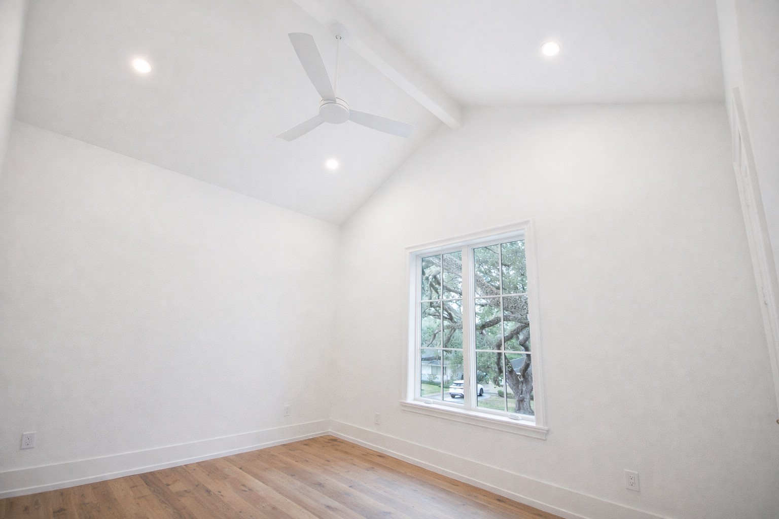 4107 Whitman Street Houston, TX 77027 - Photo 23 of 29 an empty room with wooden floor and windows