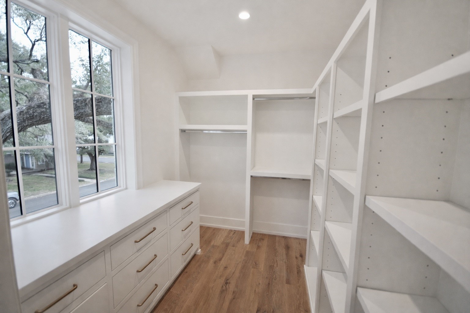 4107 Whitman Street Houston, TX 77027 - Photo 25 of 29 a bathroom with a sink and a large mirror