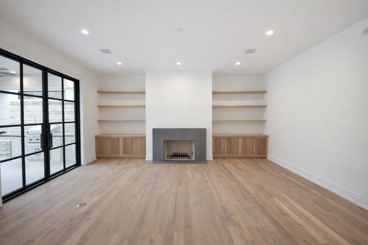 4107 Whitman Street Houston, TX 77027 - Photo 4 of 29 a view of a livingroom with a fireplace cabinet and window