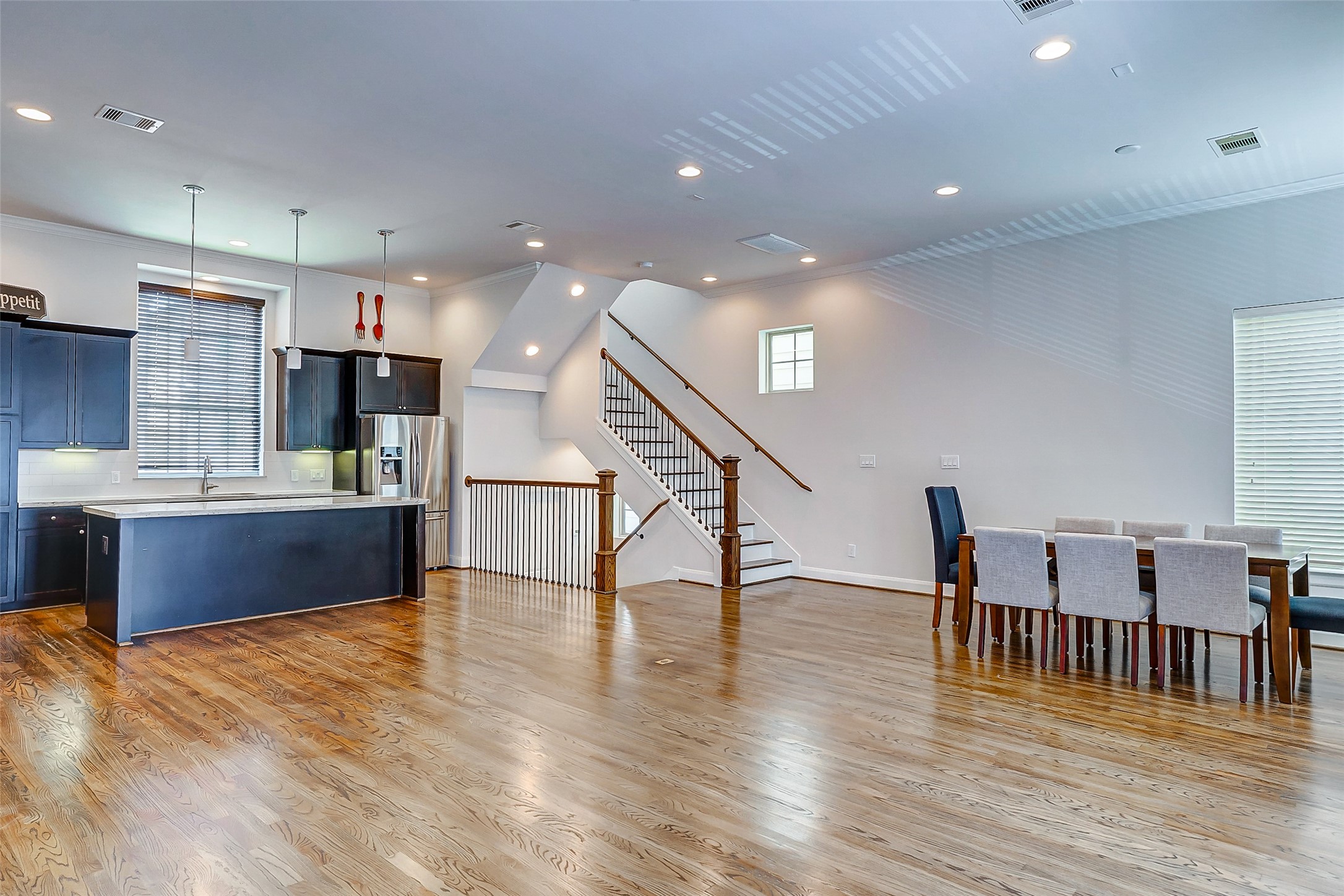 2209 Chenevert Street, Unit C Houston, TX 77003 - Photo 12 of 26 a lobby with furniture and wooden floor
