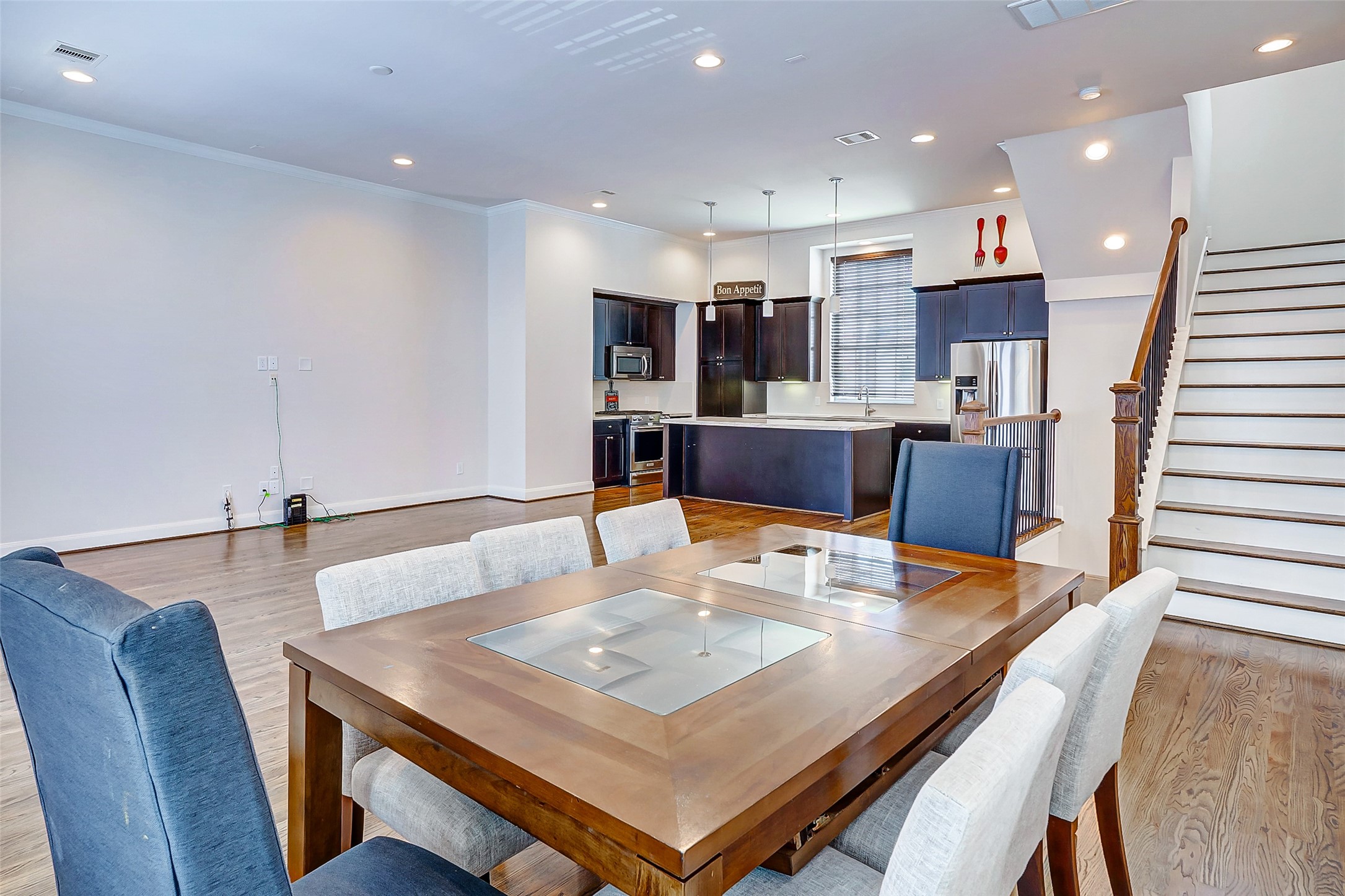 2209 Chenevert Street, Unit C Houston, TX 77003 - Photo 13 of 26 a view of a dining room with furniture
