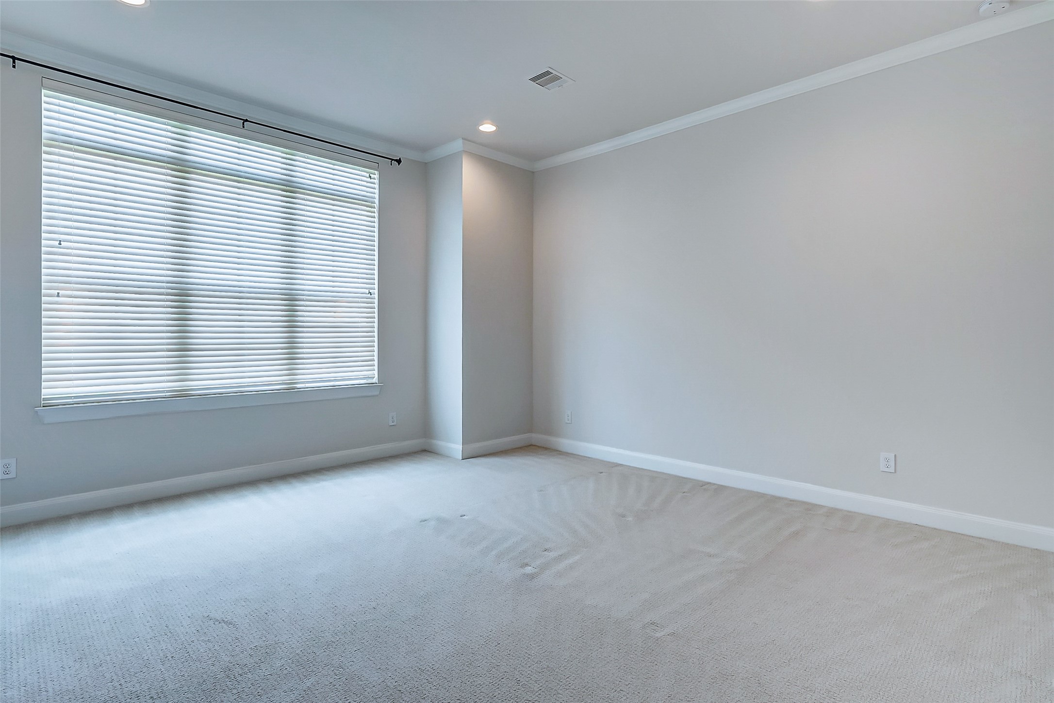 2209 Chenevert Street, Unit C Houston, TX 77003 - Photo 14 of 26 an empty room with windows