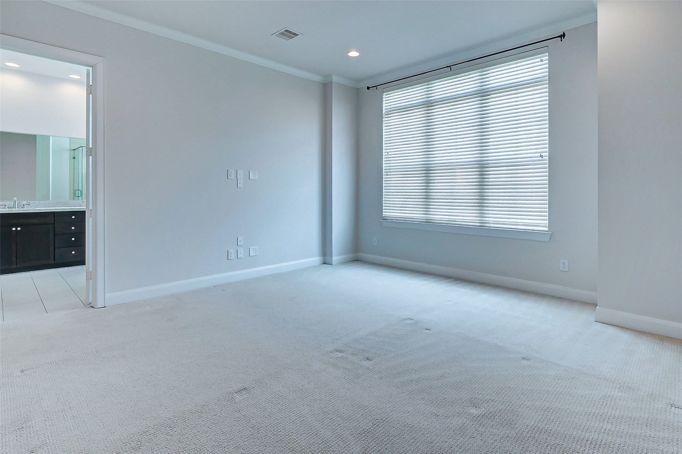 2209 Chenevert Street, Unit C Houston, TX 77003 - Photo 16 of 26 an empty room with a empty space and windows