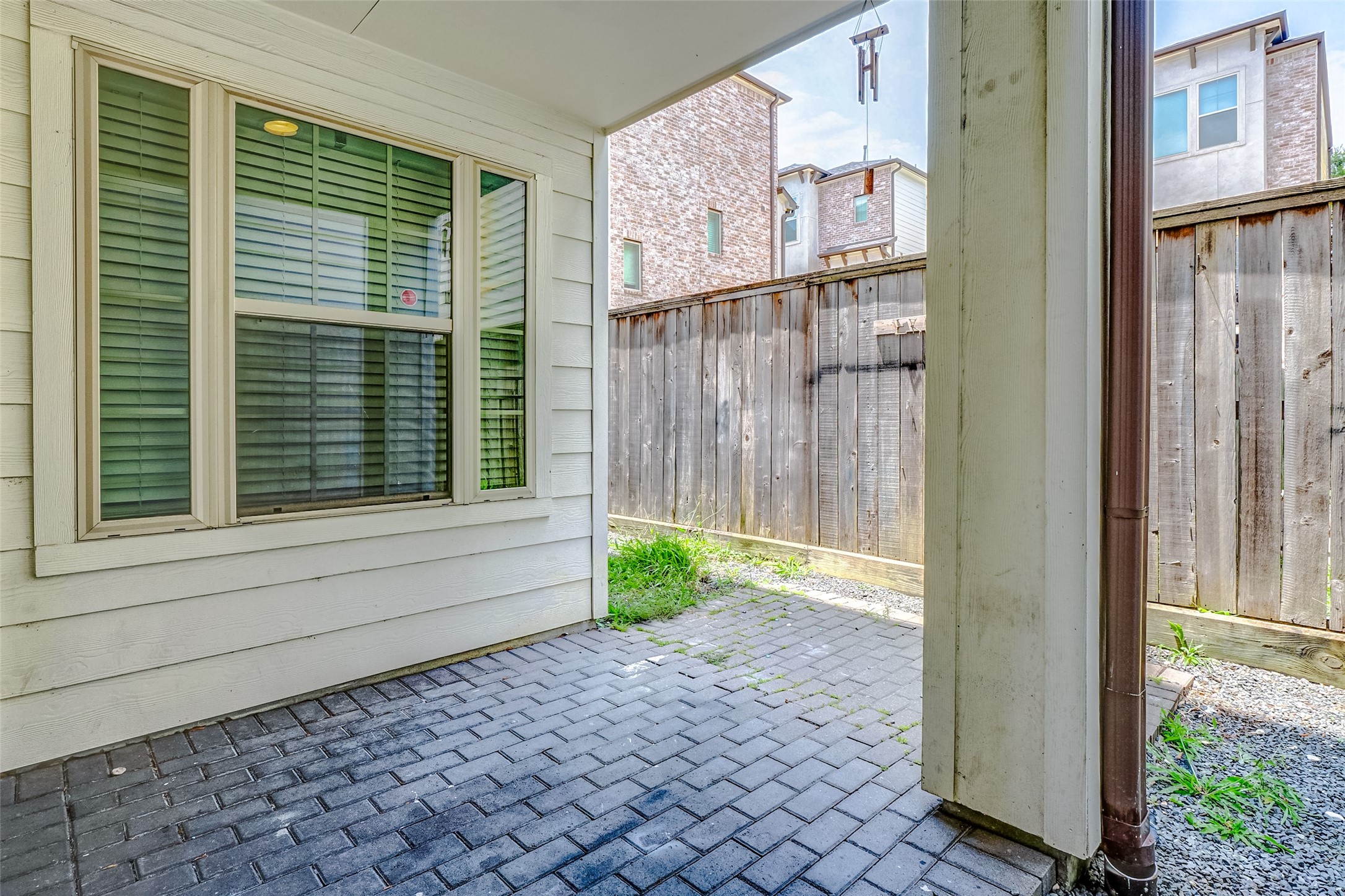 2209 Chenevert Street, Unit C Houston, TX 77003 - Photo 26 of 26 a view of a back yard of the house