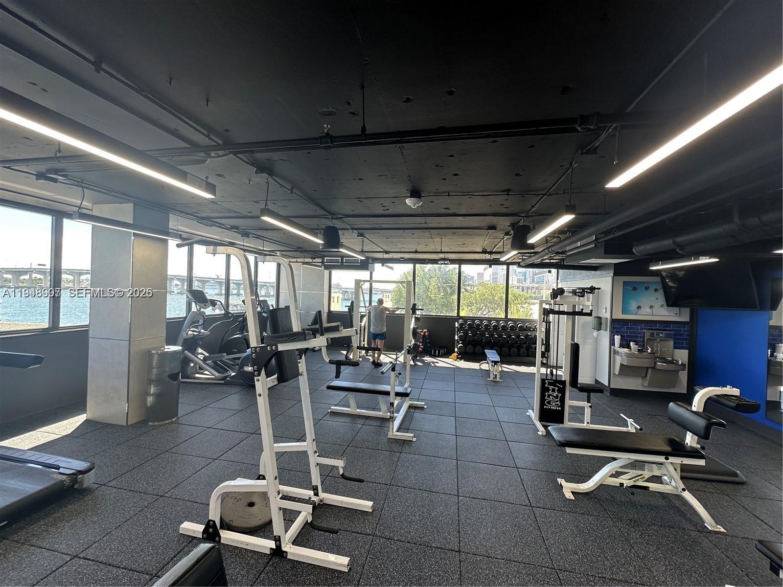 555 Northeast 15th Street, Unit TSA Miami, FL 33132 - Photo 18 of 24 a view of a room with gym equipment