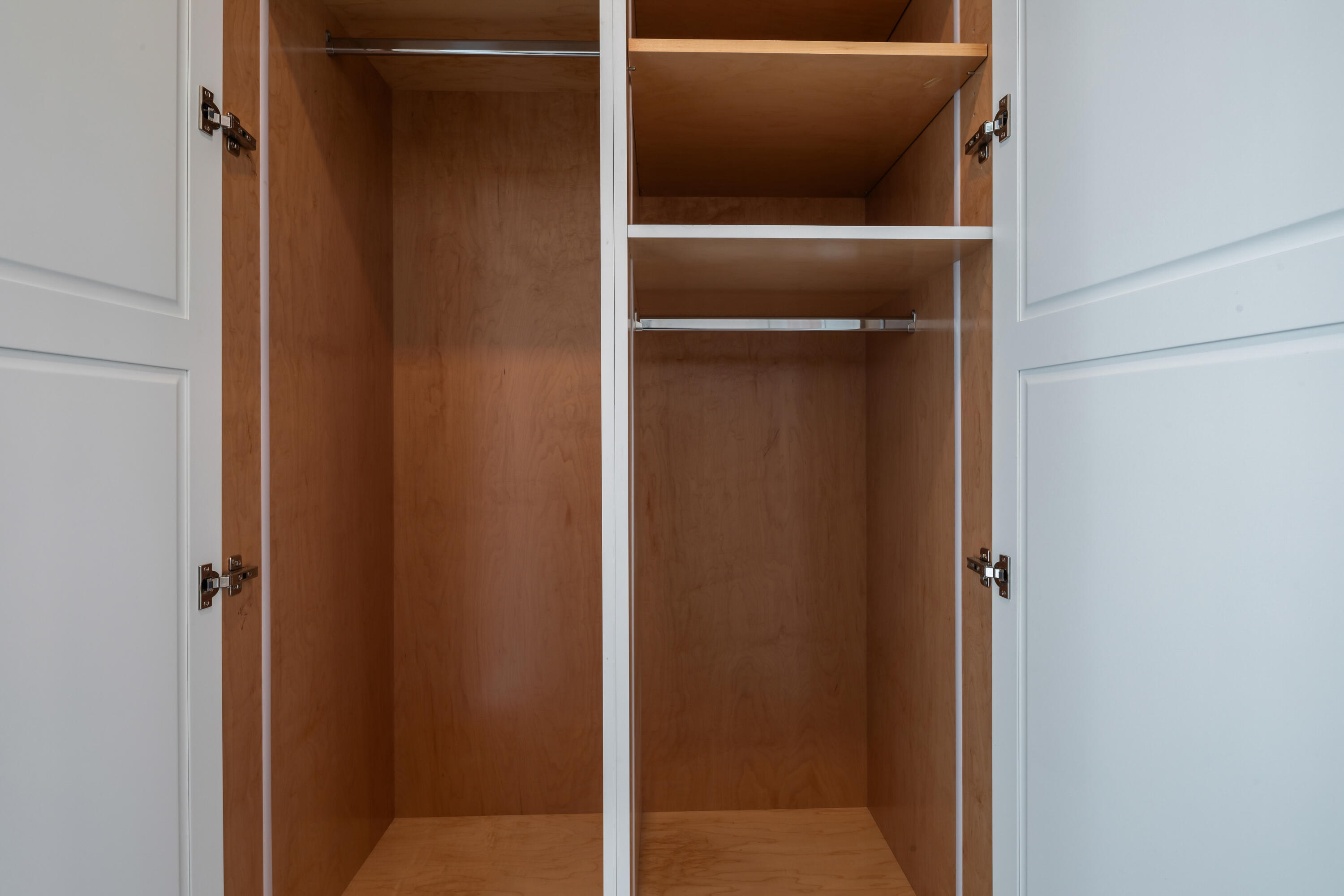 1614 Washington Street Key West, FL 33040 - Photo 43 of 59 a view of walk in closet with empty racks