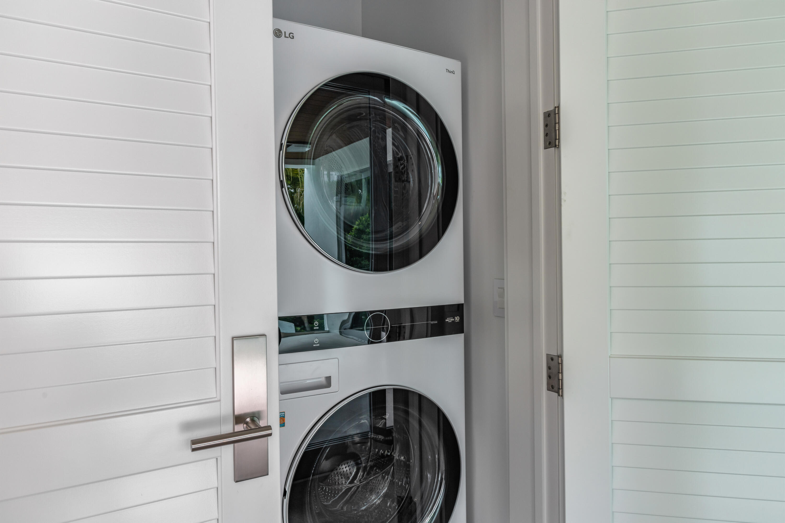 1614 Washington Street Key West, FL 33040 - Photo 46 of 59 a utility room with dryer and washer