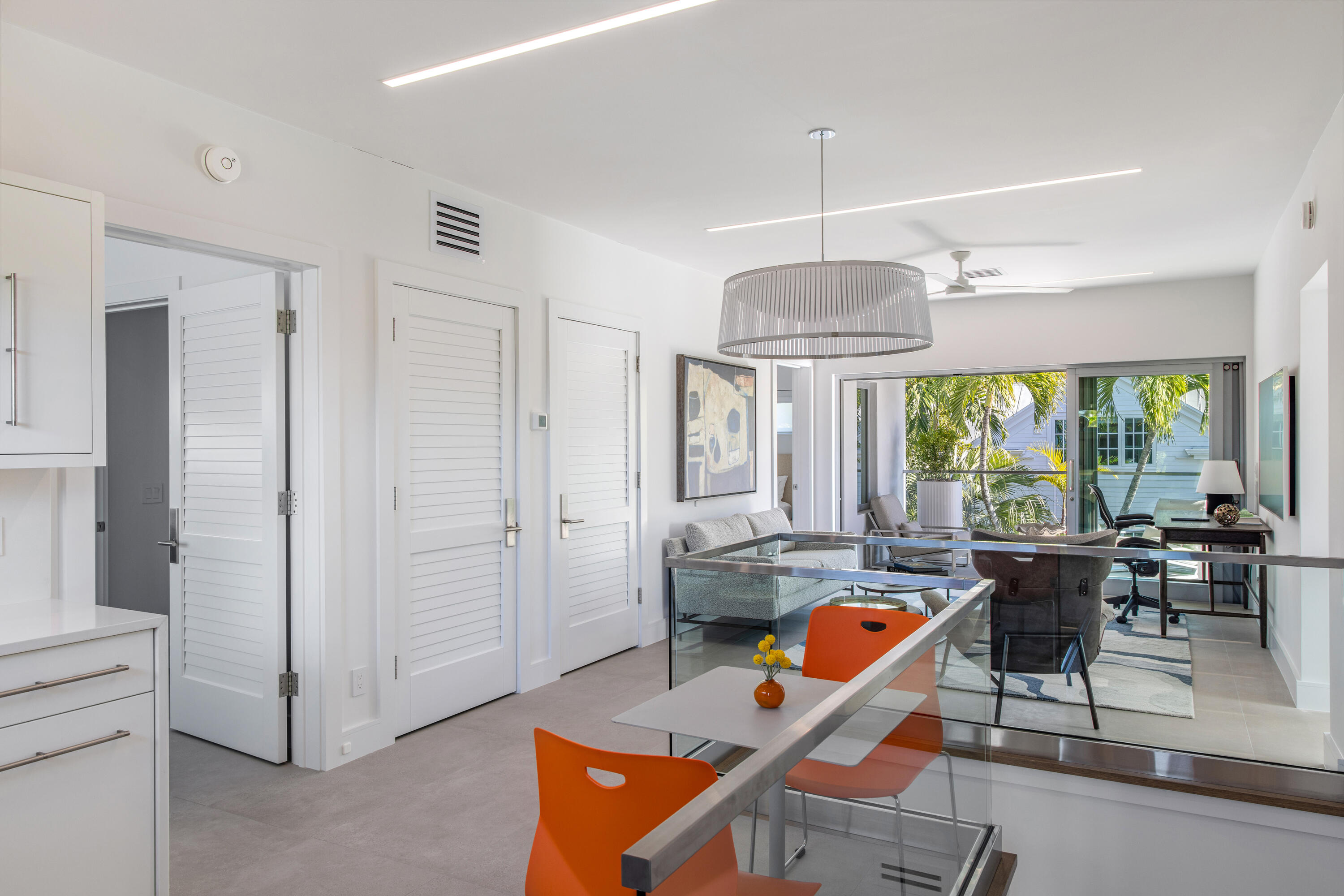 1614 Washington Street Key West, FL 33040 - Photo 48 of 59 a room with lots of windows and white walls