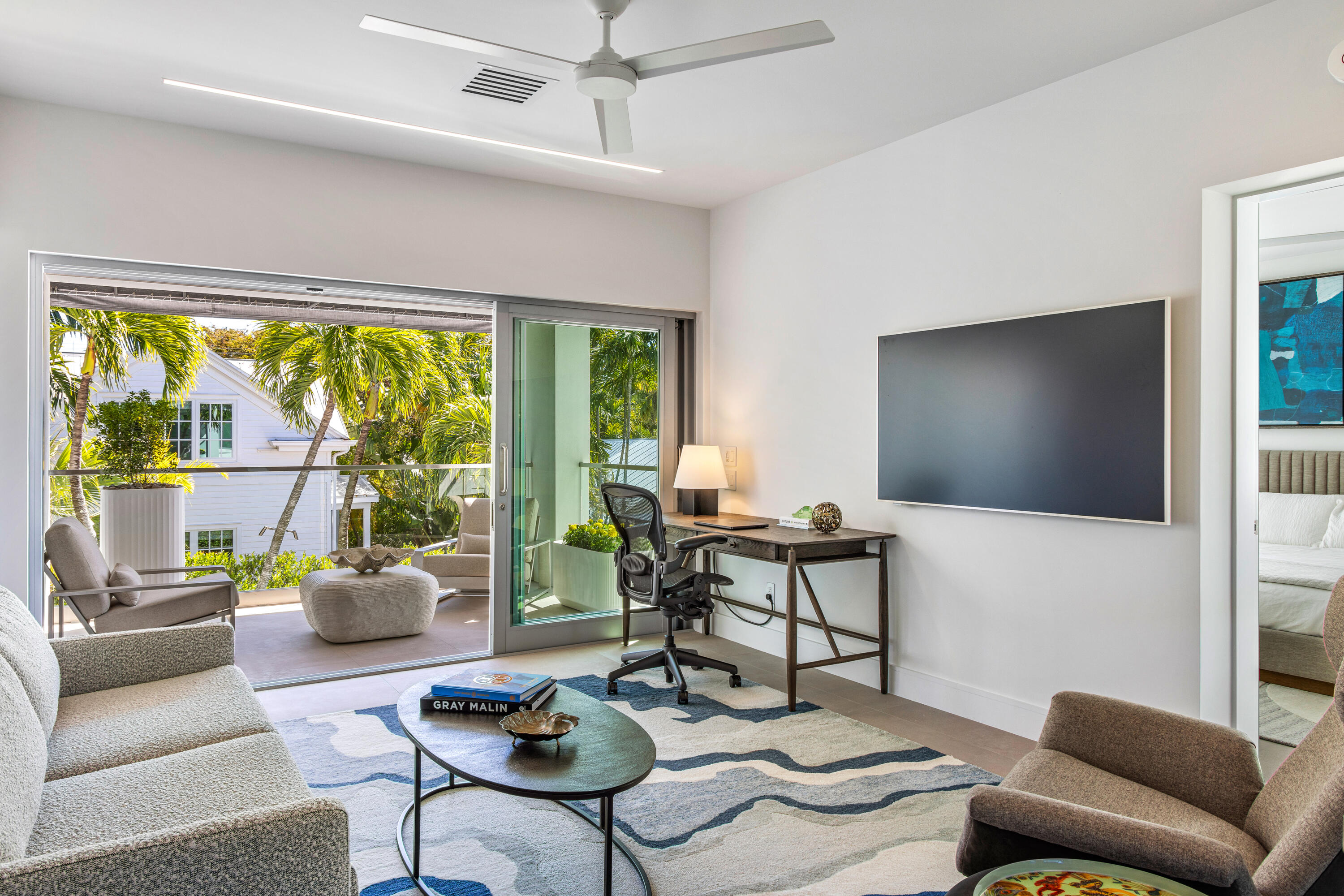 1614 Washington Street Key West, FL 33040 - Photo 51 of 59 a living room with furniture and a flat screen tv