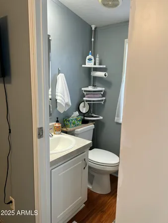 a kitchen with a sink a stove a microwave and cabinets