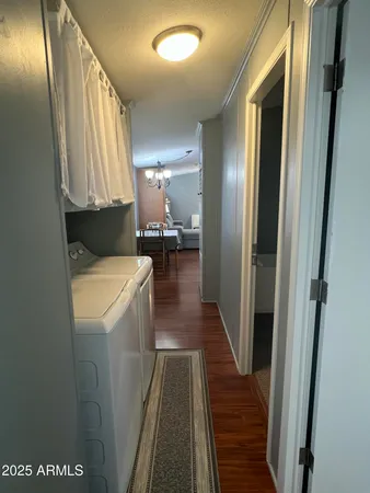 a view of a living room with a large window