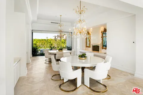 a view of living room with furniture and flat screen tv