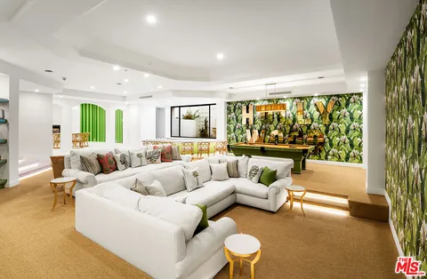 a bathroom with a bathtub and next to a window