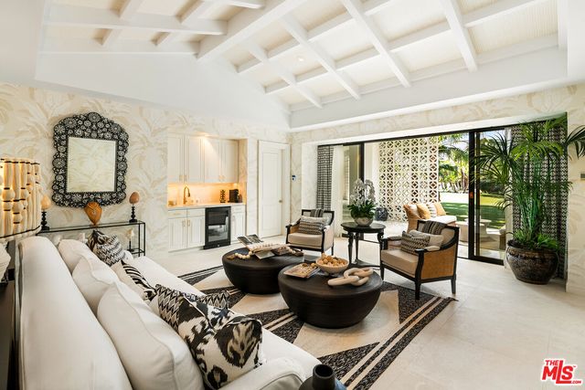 a view of a terrace with a garden and mountain view