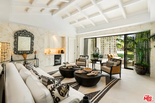 a view of a terrace with a garden and mountain view