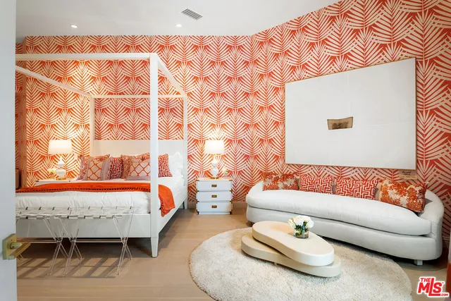 an aerial view of a house with a lake view