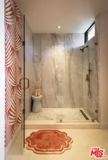 a view of a house with swimming pool and porch