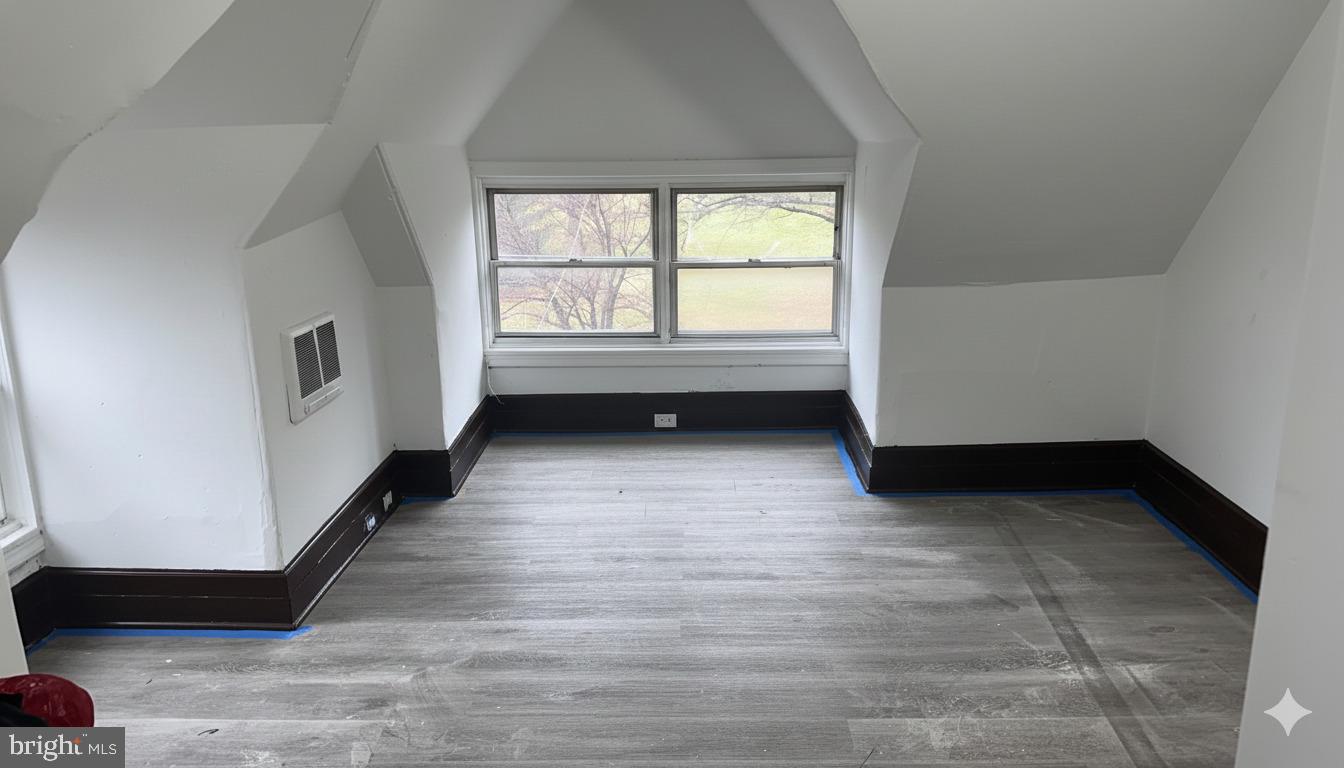 4635 Leiper Street, Unit 5 Philadelphia, PA 19124 - Photo 2 of 9 a view of an empty room with a window