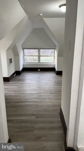 a view of an empty room with a sink