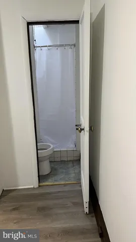 a view of bathroom with a toilet