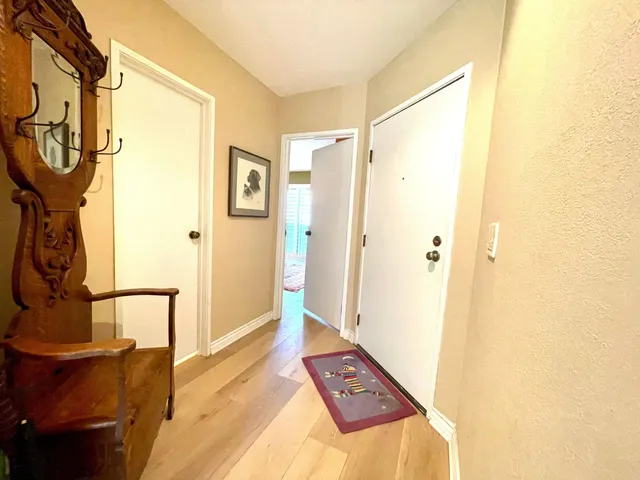 a bathroom with a shower and a sink