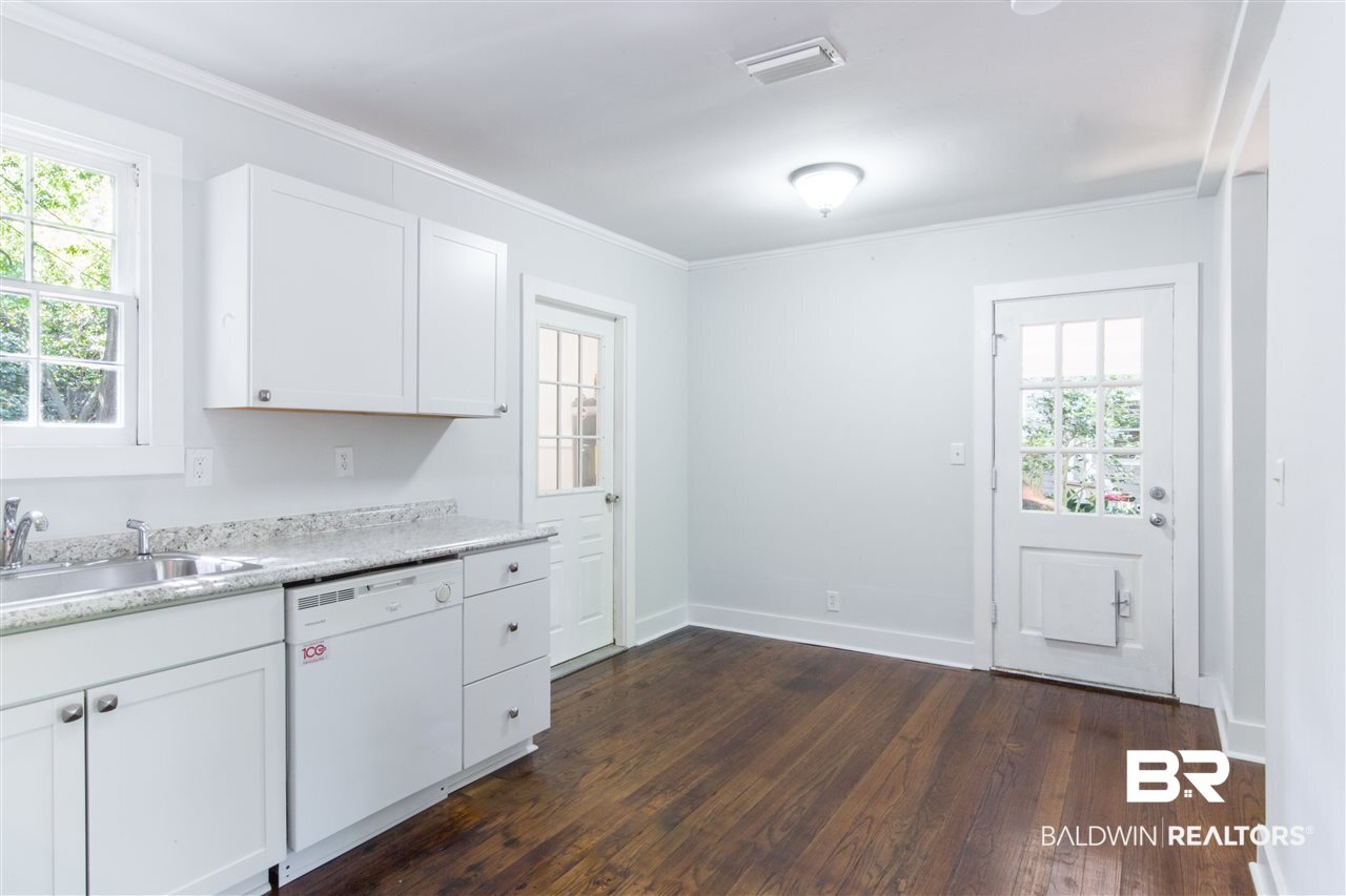 328 Azalea Circle West Mobile, AL 36608 - Photo 6 of 19 Laundry door to the left and patio door right