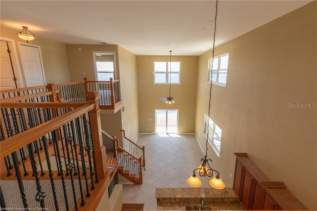 1900 Oasis Boulevard Sebring, FL 33870 - Photo 16 of 18 a view of an entryway with wooden floor