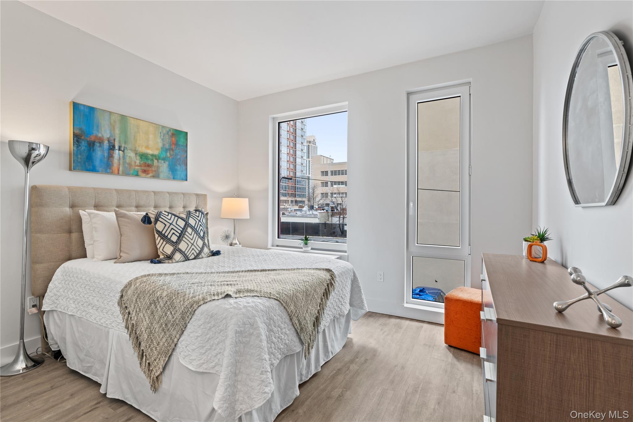 40 Westchester Place, Unit 602 New Rochelle, NY 10801 - Photo 6 of 6 a bedroom with bed and window