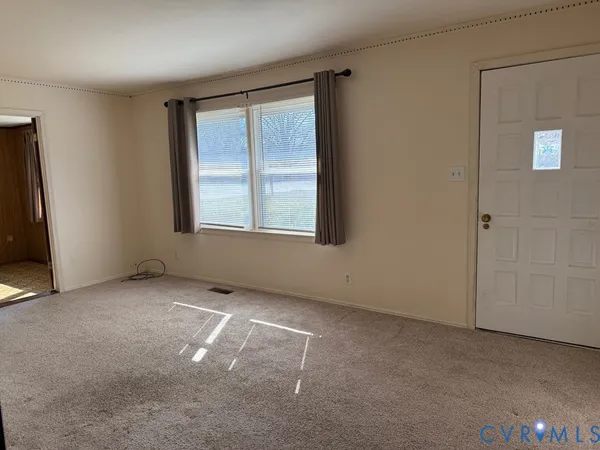 an empty room with windows