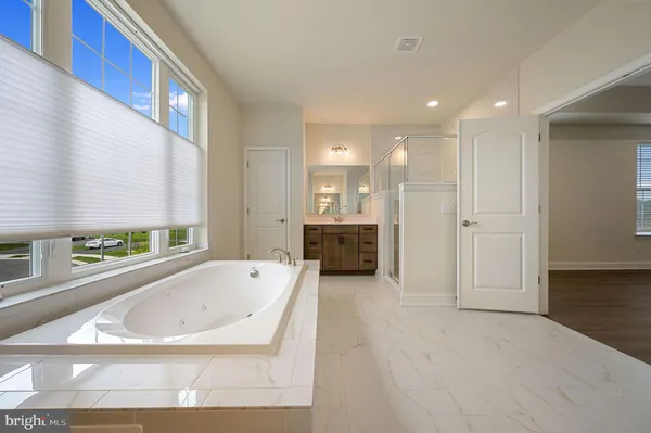 a view of a bathtub in a room