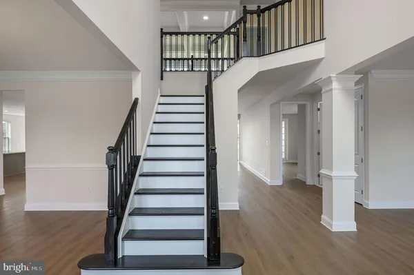 a view of entryway with wooden floor
