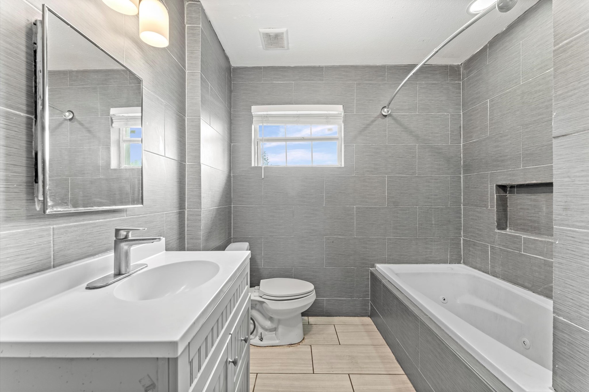 8710 Congo Lane Houston, TX 77040 - Photo 22 of 50 a bathroom with a sink a toilet and shower