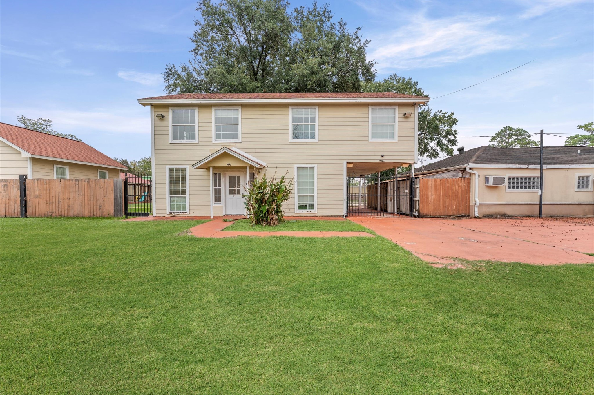 8710 Congo Lane Houston, TX 77040 - Photo 37 of 50 a front view of a house with a yard and garage