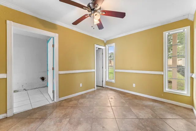 a view of an empty room and window