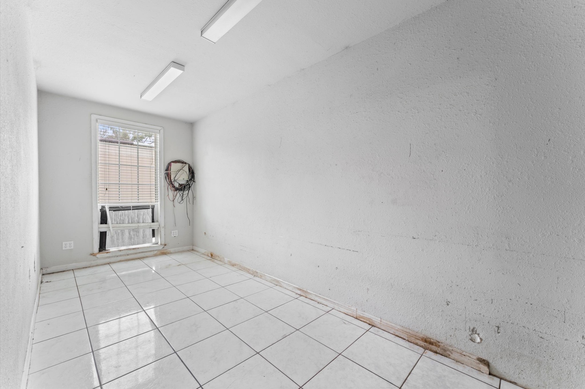 8710 Congo Lane Houston, TX 77040 - Photo 40 of 50 a view of an empty room and window