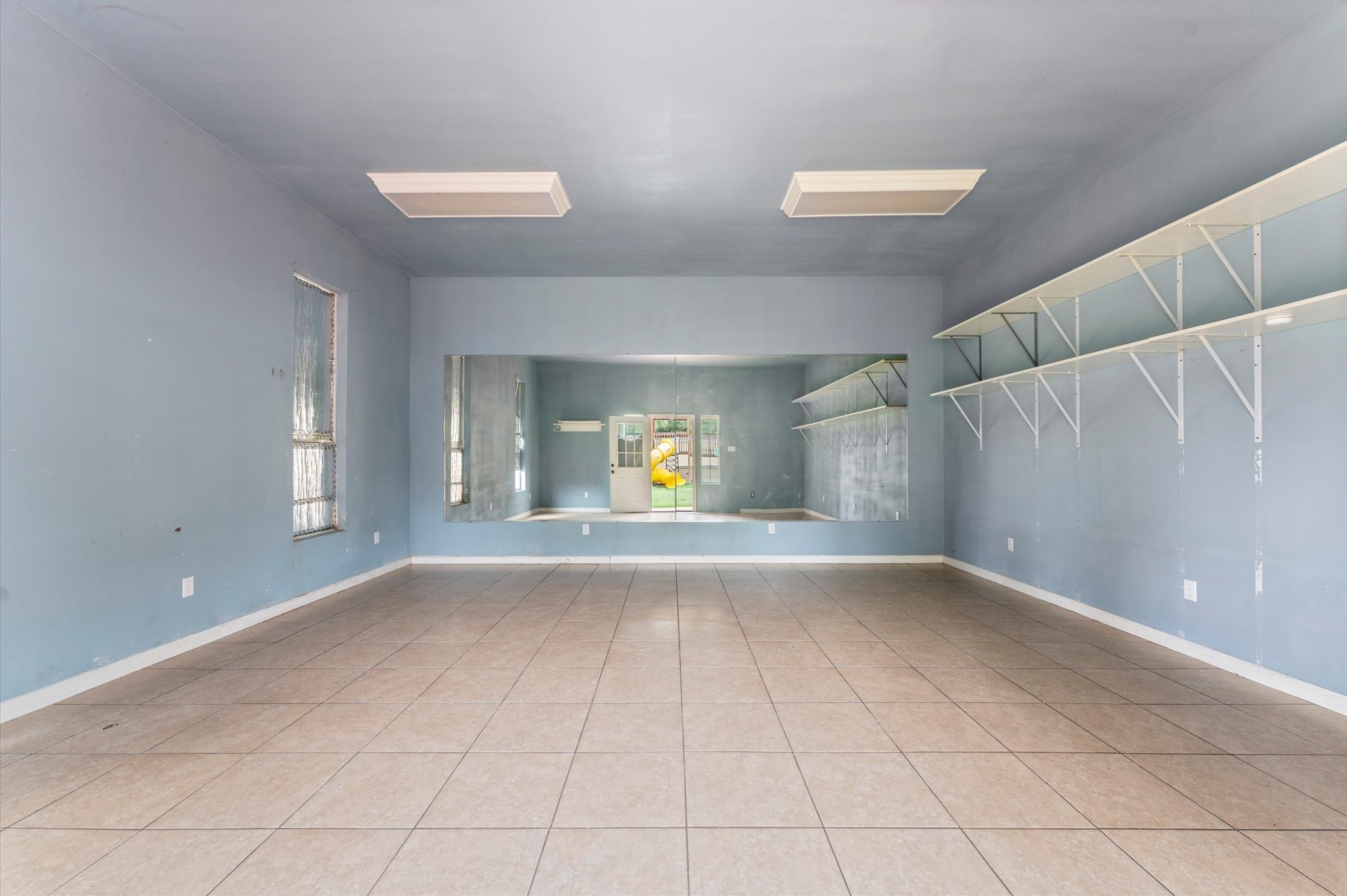 8710 Congo Lane Houston, TX 77040 - Photo 47 of 50 a view of an empty room with window and wooden floor
