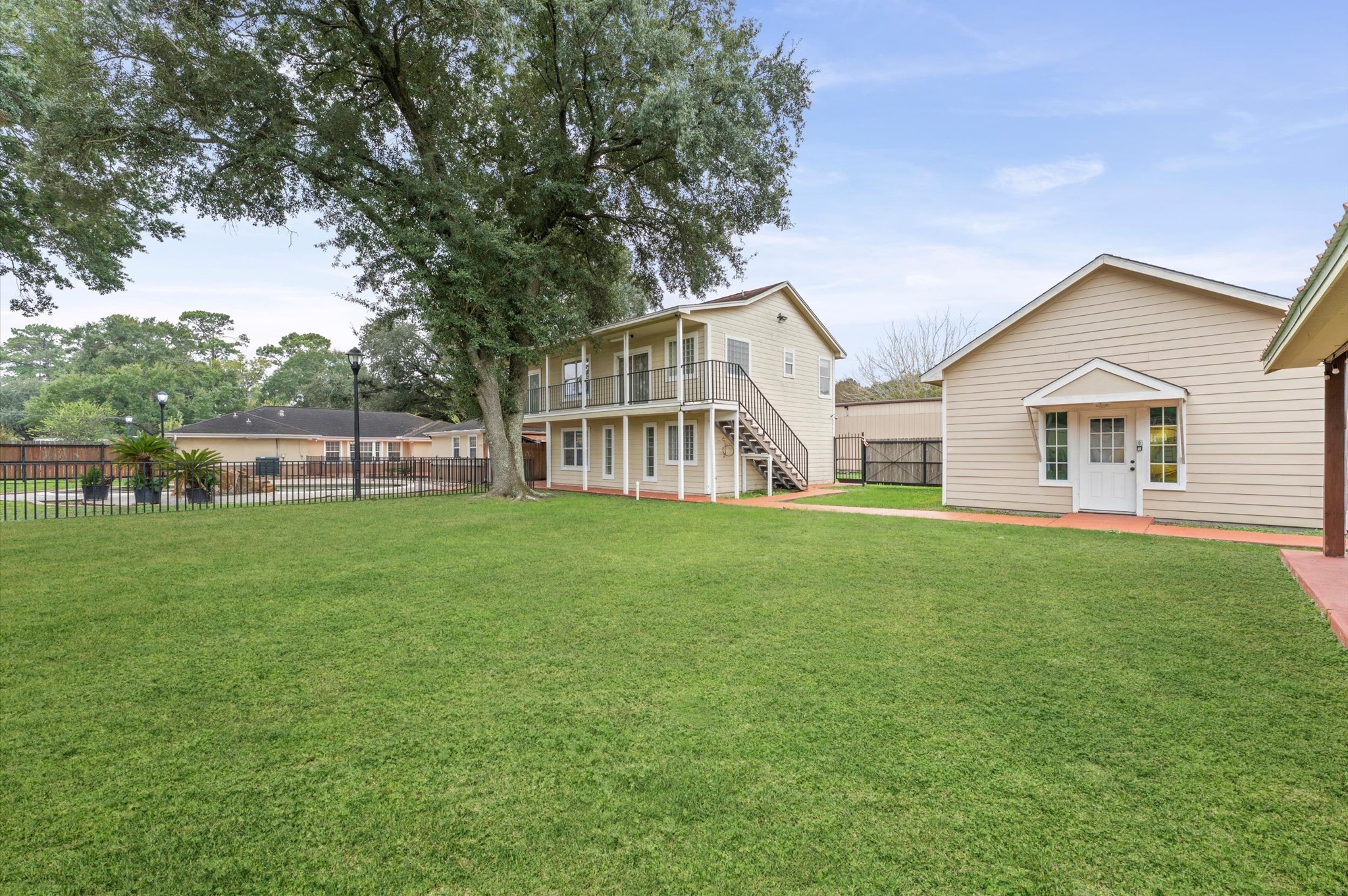 8710 Congo Lane Houston, TX 77040 - Photo 48 of 50 a front view of a house with a garden