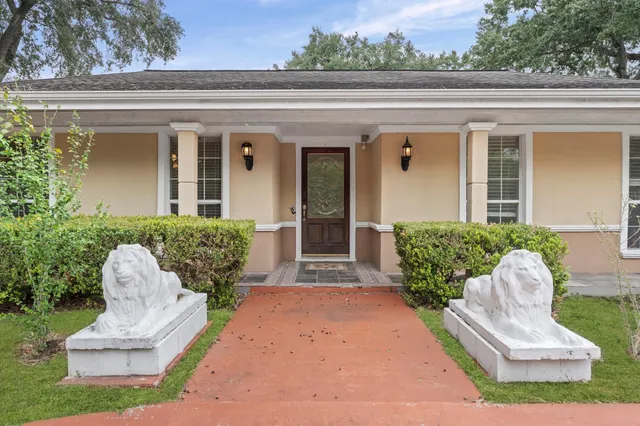 front view of a house with a chairs
