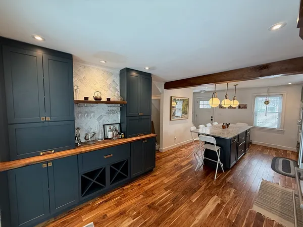 a room with furniture and a wooden floor