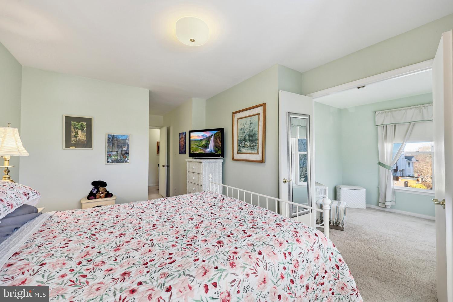 6029 Sunset Ridge Court Centreville, VA 20121 - Photo 13 of 31 a bedroom with a bed and a dresser