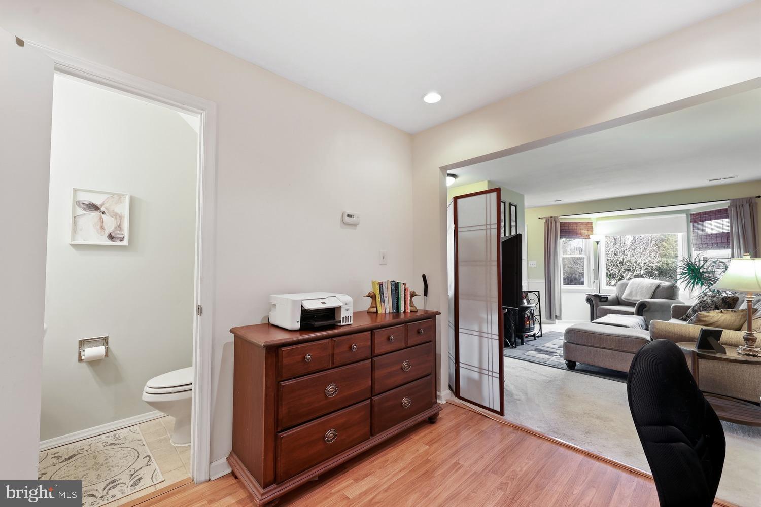 6029 Sunset Ridge Court Centreville, VA 20121 - Photo 18 of 31 a living room with furniture and a window