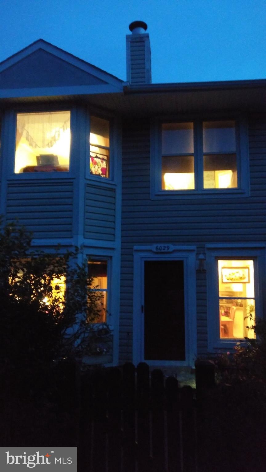 6029 Sunset Ridge Court Centreville, VA 20121 - Photo 23 of 31 a front view of a house with a yard