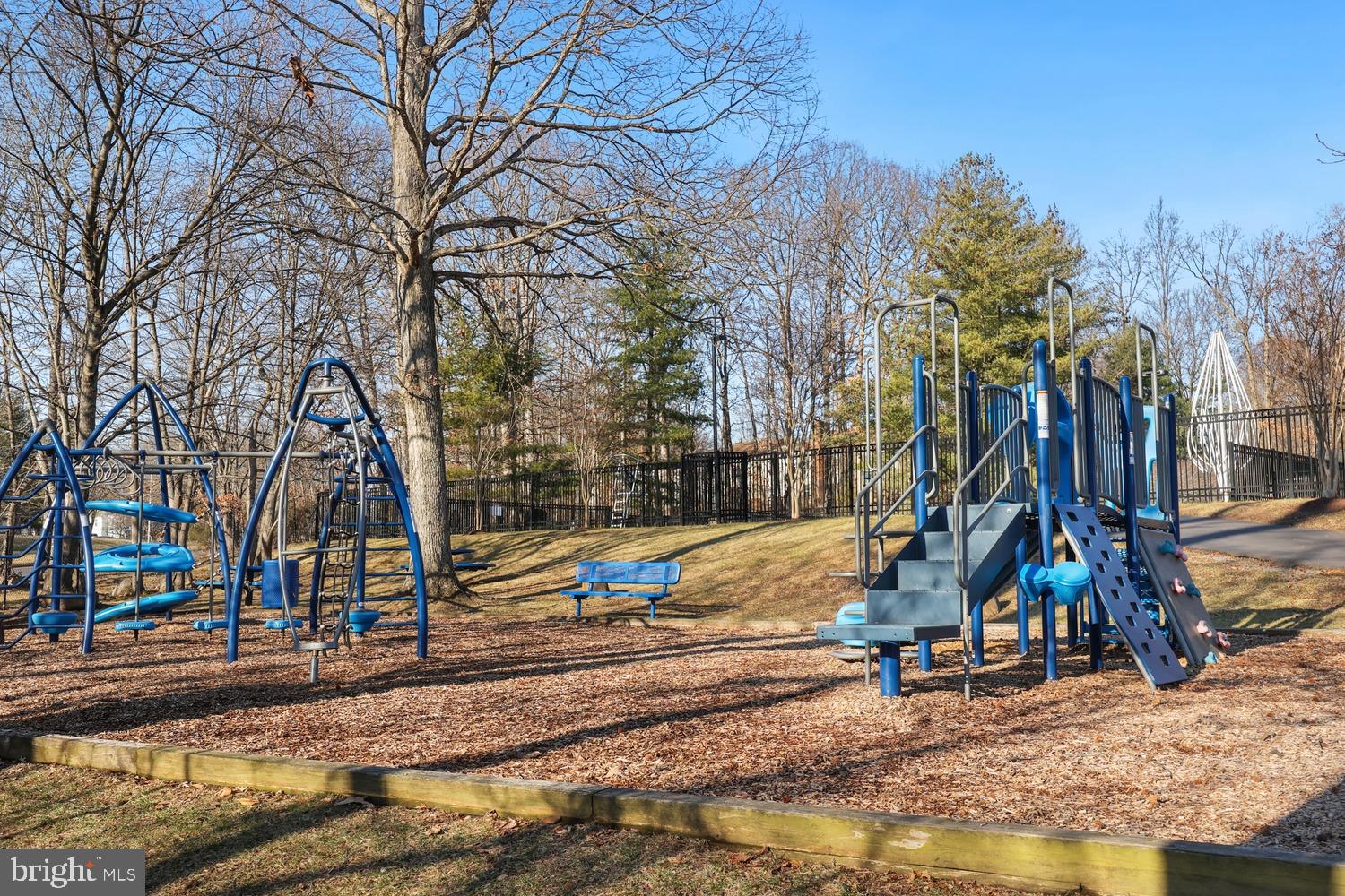 6029 Sunset Ridge Court Centreville, VA 20121 - Photo 27 of 31 a view of a park with swings and slides